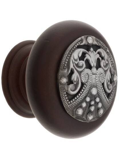 1 1/2 inch Diameter Regal Crest Knobs in Dark Walnut/Antique Pewter.